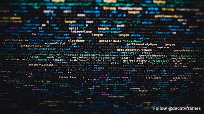 Software developer programming code on black background